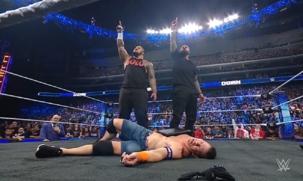 Bloodline members Solo Sikoa and Jimmy Uso (with Paul Heyman) after knocking out John Cena on WWE Smackdown September 22 2023